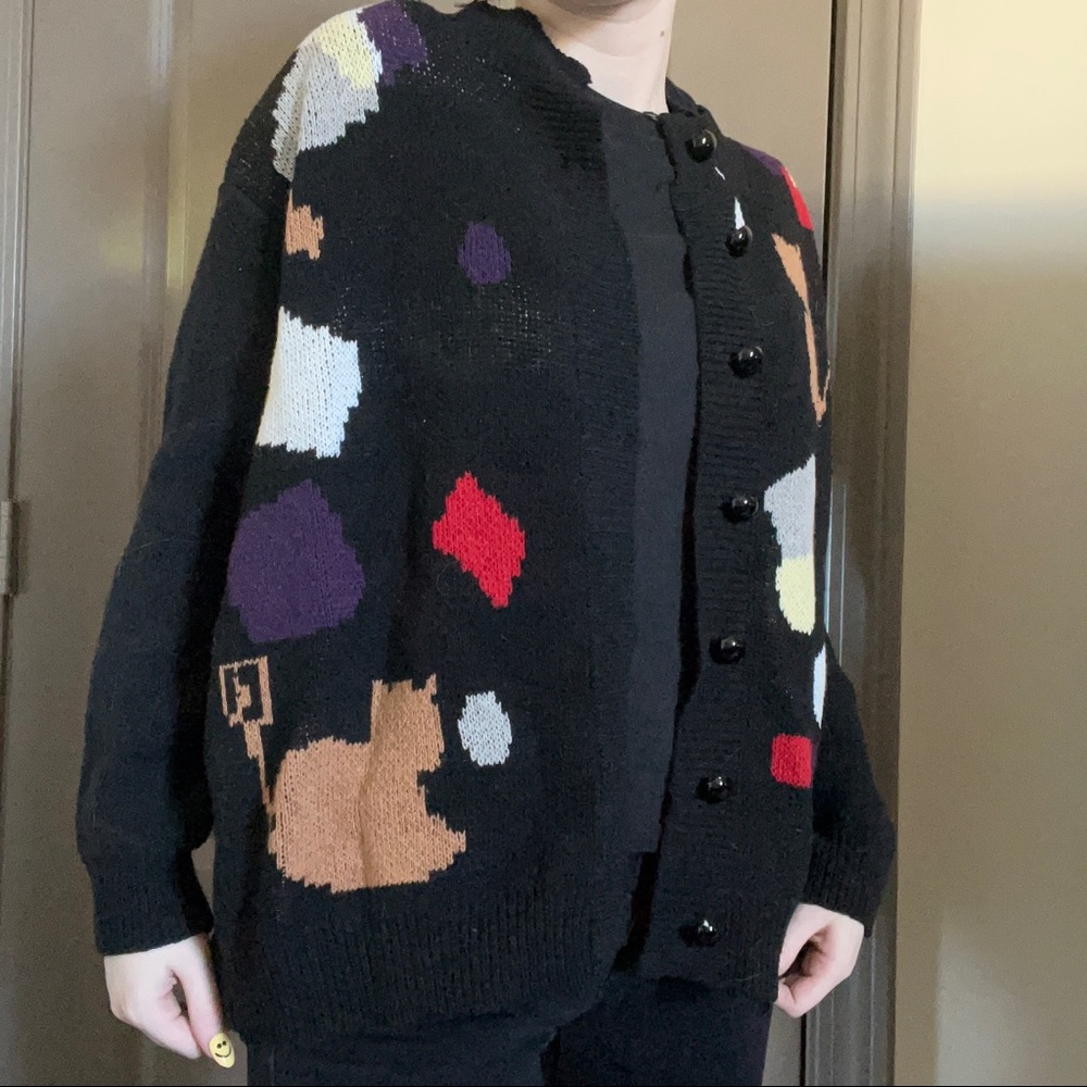 black knit button-up cardigan with diamonds and cats